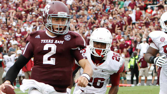 Texas A&M quarterback Johnny Manziel scores a touchdown against Arkansas.